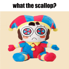 a stuffed toy with a sad face and the words what the scallop