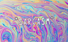 the word sarcasm is written in white letters on a colorful background .