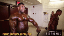 npc news online is powered by performix and shows a bodybuilder lifting a dumbbell