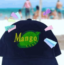 a black hat with the word mango on the back