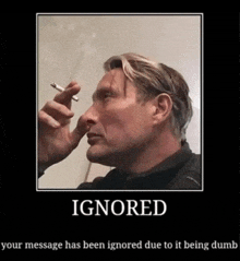 a poster of a man smoking a cigarette with the words ignored below him