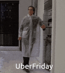 a man in a white coat is standing in front of a door with the words uber friday written on it