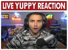 a man wearing headphones is sitting in front of a microphone with the words live yuppy reaction written above him