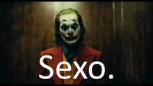 a poster of a clown with the word sexo written below him