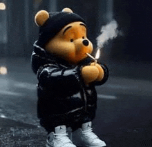 winnie the pooh is smoking a cigarette while wearing a black jacket and hat .