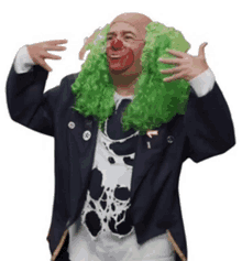 a man dressed as a clown with green wig and red nose