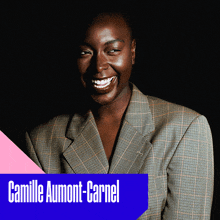 a woman in a plaid jacket is smiling and the name camille aumont-carnel is on a blue block