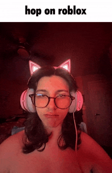 a woman wearing cat ears and headphones with the words hop on roblox above her