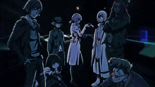 a group of people standing in a dark room