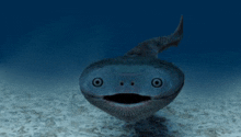 a shark with a smiley face is swimming in the water