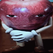 a close up of a cartoon apple with a sad look on its face