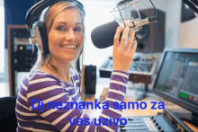 a woman wearing headphones is smiling while holding a microphone with the words dj nezhanka samo za vas uzivo below her