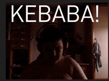 a man wearing headphones with the words kebaba on the top