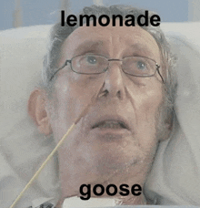 a man is laying in a hospital bed with a needle in his nose and the words lemonade goose on the bottom