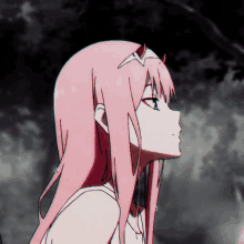 a girl with pink hair and a crown on her head