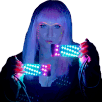 a woman with glow in the dark paint on her face holds two glow in the dark objects in her hands