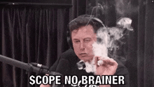 elon musk is smoking a cigarette in front of a microphone .