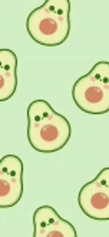 a seamless pattern of avocados on a green background .