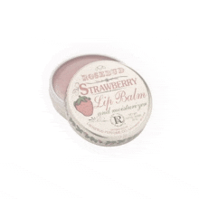 a rosebud strawberry lip balm and moisturizer in a tin