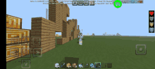 a screenshot of a minecraft game on a phone with a green screen that says ' beta 1.18.32.0 '