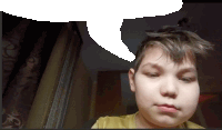 a young boy looks at the camera with a speech bubble behind him