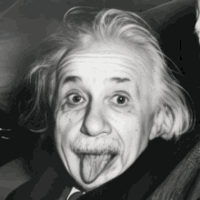 a black and white photo of albert einstein sticking out his tongue