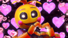 a yellow cartoon character is surrounded by pink hearts on a black background .