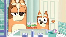 two cartoon dogs are brushing their teeth in front of a mirror