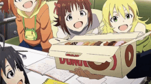 a box of donuts sits on a table surrounded by anime characters