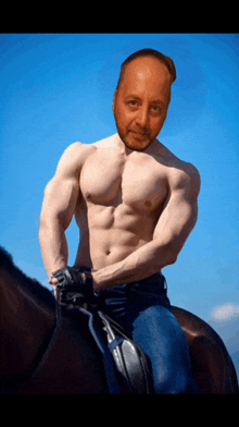 a shirtless man is riding a brown horse