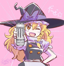 a girl in a witch hat is holding a can of monster energy drink