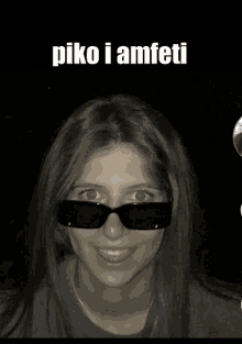 a woman wearing sunglasses with piko i amfeti written on the bottom