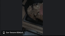 a phone screen shows a video of a person cooking and says son tencere bukucu