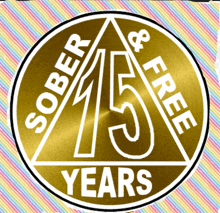 a gold coin with the words sober and free on it