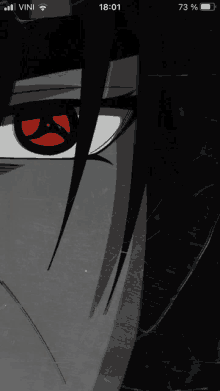 a close up of a person 's face with a red eye and the time of 18:01