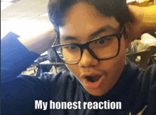 a young man wearing glasses is making a funny face with the caption my honest reaction