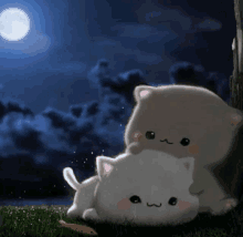 two cats are laying under a tree at night with a full moon in the background