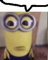 a close up of a minion with big eyes and a speech bubble above it