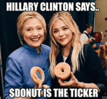 two women holding donuts with the caption hillary clinton says $donut is the ticker