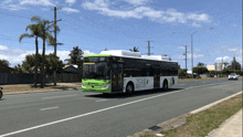 a bus that says zero on the side is driving down the road