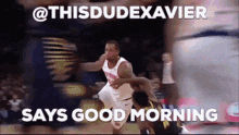 a basketball player is dribbling a ball and says good morning