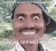 a man with a mustache is smiling with the words " bluetooth ep patched duping patched " behind him