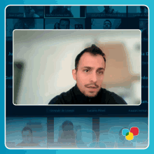 a man in a black shirt is talking on a video call