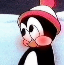 a close up of a cartoon penguin wearing a pink hat