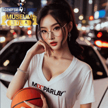 a woman holding a basketball wearing a mix parlay shirt