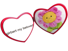 a heart shaped mirror with a picture of a pink flower and the words " gilbert my beloved "