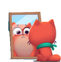 a cat is looking at itself in a mirror .