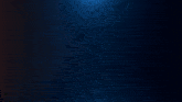 a glowing circle with smoke coming out of it on a dark blue background