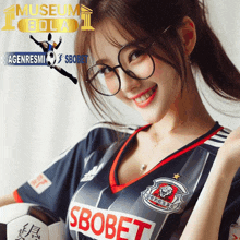 a girl wearing a soccer jersey that says sbobet