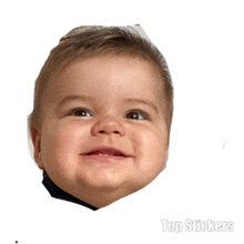 a picture of a baby 's face with the words top stickers written below it